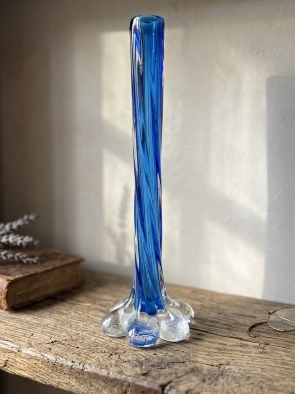 Vintage Murano glass bud vase 
blue twisted stem
clear "elephant foot" base